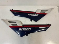 Carénage sous selle gauche et