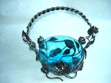 Wrought iron centerpiece with roses and leaves