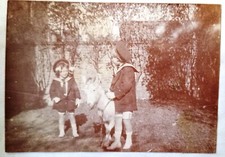 AZ511 photo circa 1914 family two children and goat