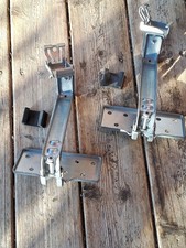 Fixations sur toit tuiles bombées pour rail panneaux photovoltaïques