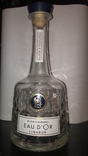 Empty Bottle of Eau D’or Liquor. French Liqueur.