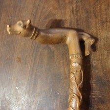 art populaire belle  Canne en bois sculpté avec un pommeau à 2 tetes