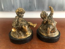 PAIRE DE PUTTI EN RÉGULE