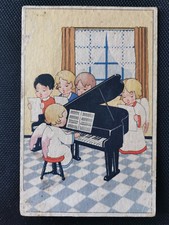 CPA Illustration d'un enfant avec des ailes jouant du piano