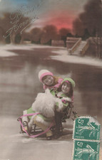 CP ON SLEDGE LITTLE GIRL FUR SLEEVE AND BOY HAT