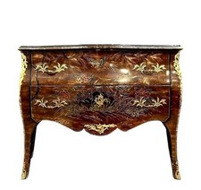Commode sauteuse galbée en