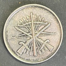 Médaille en argent, Tir