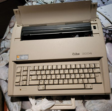 MACHINE A ECRIRE ELECTRIQUE PORTABLE MARQUE ERIKA 3004 FONCTIONNELLE