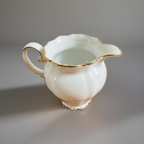 Pot lait à - à,