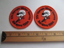 2 RARE 1984 SARAJEVO MASCOT LUGE BOBSLED BOBSLEIGH  OLYMPIC PATCH CREST BADGE
