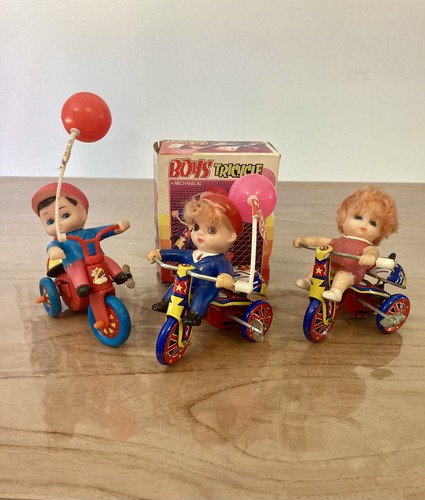 Boys and girls tricycle - and,