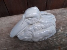 antique folk art pelican earthenware breaking piggy bank
