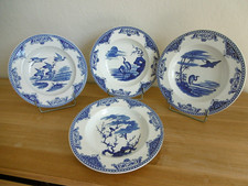 QUATRE ASSIETTES CREUSES