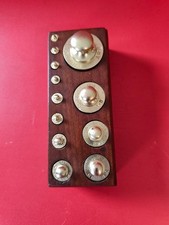 boite de 12 poids en laiton