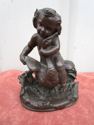 Statuette cherubin tenant une - statuette,