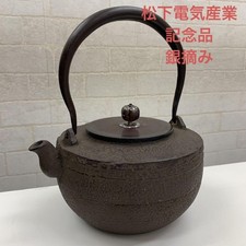 Ancienne théière en fonte