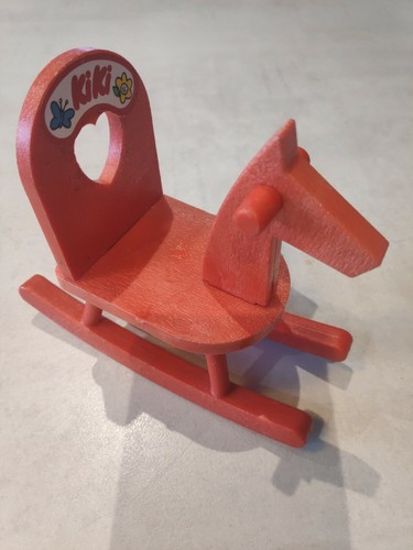 Kiki cheval bascule - à,
