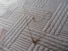 collier avec pendentif en or