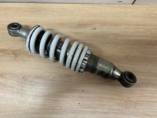 UN AMORTISSEUR ARRIERE MOTO