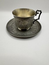 Tasse et soucoupe ancienne en