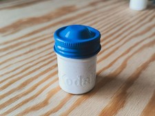 Vintage Kodak metal film canister for 35mm roll, blue & white