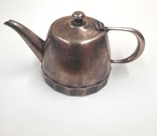 théière ancienne en métal