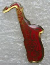 Pin's Instrument de Musique Un Saxophone rouge #583