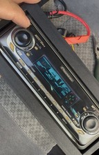 Pioneer DEH P7400MP Stereo With Harness’ With Dolphins & Indy Car Screensaver