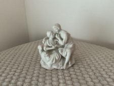 Petit couple en porcelaine