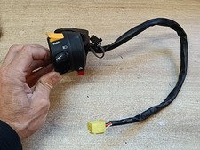 UN COMMODO COMMANDE GAUCHE