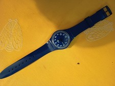 Montre Swatch mixte Bleu marine pile neuve fonctionne O.K.  Swiss Made  Suisse