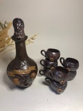 Service à Calvados - bouteille de Calvados avec son bouchon et ses 7 tasses