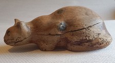 Chat couché sculpture bois