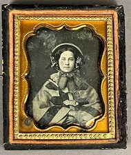 1/9 PLATE DAGUERREOTYPE YOUNG WOMAN W/ FLOWERED BONNET + CAPE, CONDITION ISSUES