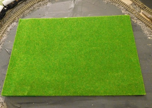 Une herbstgrüne tapis - une,
