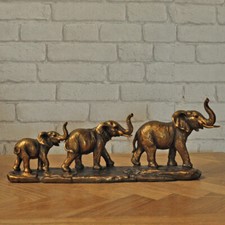 Déco famille 3 éléphants dorés 41x10x17cm