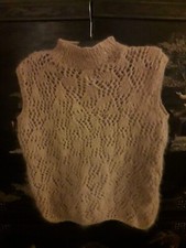 Superbe  pull sans manches