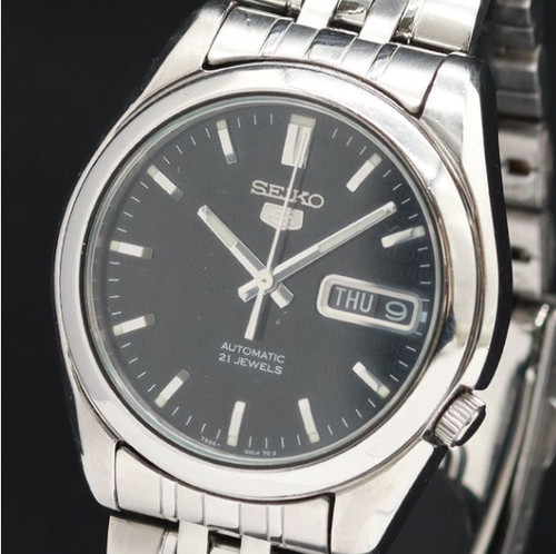 Presque comme neuve montre - neuve],