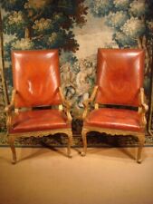 Paire de Fauteuils Régence, en bois sculpté doré, XVIIIe