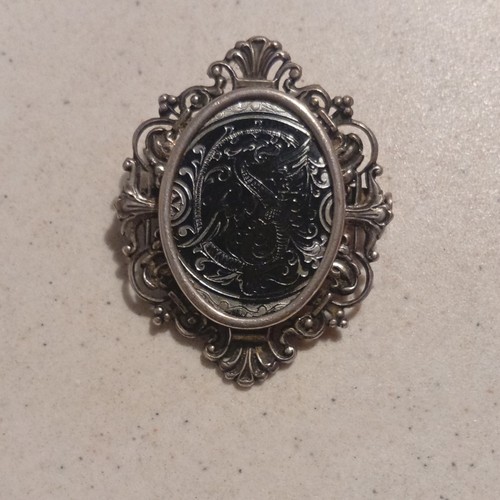 Broche ovale métal argenté