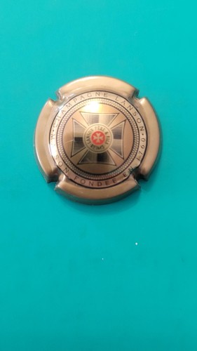 Muselet capsule de - /,
