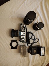 appareil photo argentique Olympus OM 10 plus 2 zoom et flash multidirectionnel 