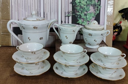Service café porcelaine de - a,