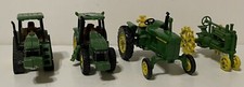 Lot Of Vintage 4 Miniature Ertl John Deere Tractors