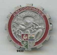 Material badge, 23 company stores, (painted)