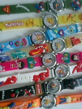 lot  3 montres pokemon  dora superman  simpson