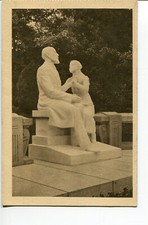 Lisieux - White marble group of "Buissonnets" St. Therese of the Child Jesus