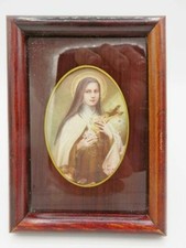 519 - Wood and painted glass easel frame - image of St. Teresa   