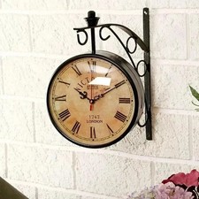Horloge murale double face de