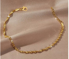 Bracelet acier inoxydable plaqué or 18k doré torsadé